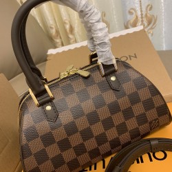 M50202Onthegomini Handbags