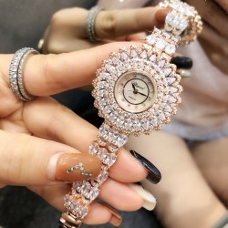 时装奢华版  肖邦-Chopard珠宝腕表：精致奢华；整表采用镶嵌技术；珍珠母贝；包镶流动水滴形透明锆钻，壳直径34mm 实拍 以创造艺术品的方式专注每一只腕表
