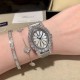 萧邦   LHEURE DU DIAMANT MEDIUM OVAL 此款LHeure du Diamant 椭圆形切割贝壳雕纹镶钻表盘 环以点缀钻石的表圈 优雅气韵 时尚风格和萧邦精湛的手工艺尽显无遗 光华耀眼