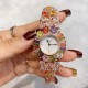 Chopard 萧邦 新款彩钻腕表：精致奢华；整表采用镶嵌技术；珍珠母贝、创意珠宝系列女士腕表镶嵌明亮式切割钻石、圆形切割钻石和蛋形彩锆石、这不仅是一款非凡的腕表，更堪称一件珠宝工艺杰作，完美结合创意、彩色宝石和打破常规的切割，彰显着品牌的魅力．壳直径33mm、
