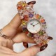 Chopard 萧邦 新款彩钻腕表：精致奢华；整表采用镶嵌技术；珍珠母贝、创意珠宝系列女士腕表镶嵌明亮式切割钻石、圆形切割钻石和蛋形彩锆石、这不仅是一款非凡的腕表，更堪称一件珠宝工艺杰作，完美结合创意、彩色宝石和打破常规的切割，彰显着品牌的魅力．壳直径33mm、